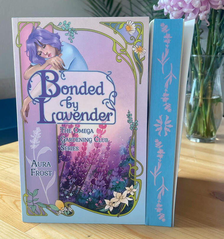 Cover + Sprayed Edge Bonded by Lavender with hand sprayed edges featuring blue and purple floral design